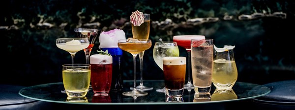 Collection of colourful cocktails lined up as part of the Blue Moves collection